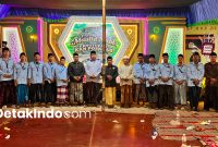 Dokumentasi kirab obor dalam rangka memperingati Maulid Nabi Muhammad SAW sekaligus penutupan KKN Universitas Annuqayah Posko 48 di Desa Banraas, Pulau Giliyang, Sumenep (Detakindo.com).